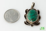 Thai Silver - Scrolled Oval Turquoise Pendant - Perfectly Reasonable Tours - Craft de Ville