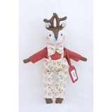 Stuffed toy deer wearing a red shirt and floral overalls on a white background