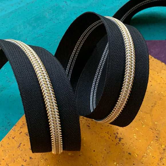 Black Zipper Tape with Gold Teeth - 3 yards